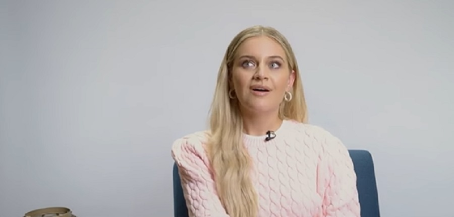 Kelsea Ballerini Wears Pastel Pink Sweater [People TV | YouTube]