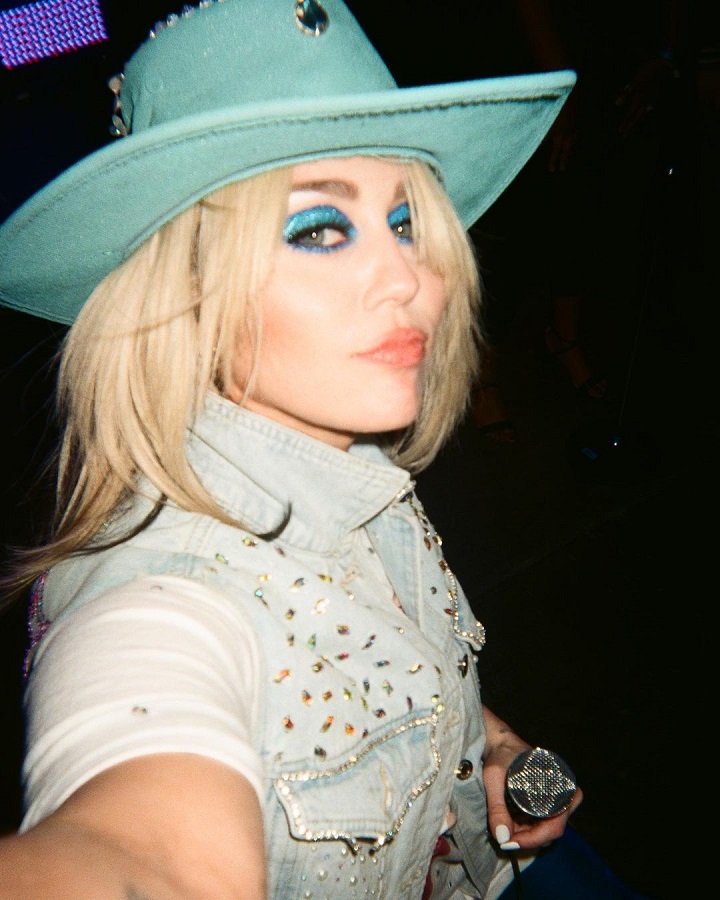 Miley Cyrus Wears Teal Cowgirl Hat [Miley Cyrus | Instagram]