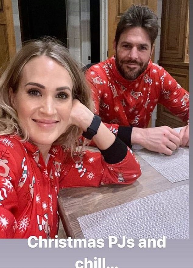 Carrie Underwood & Mike Fisher Wear Christmas PJs [Source: Carrie Underwood - Instagram Stories]