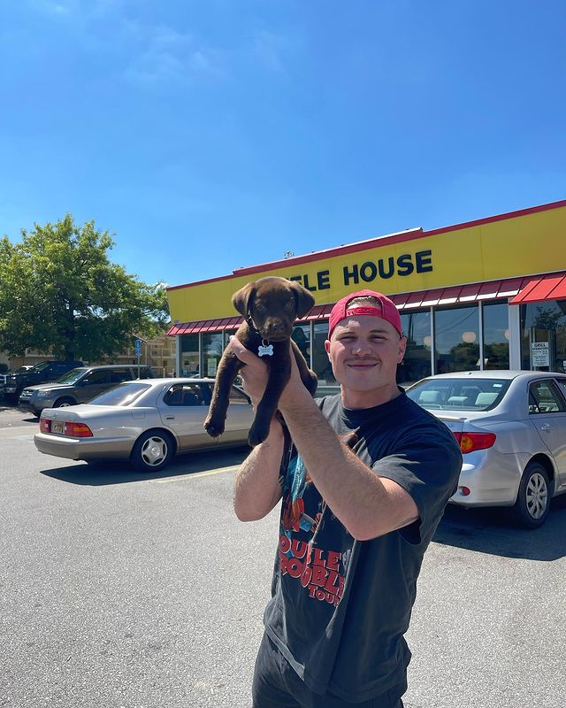 Zach Bryan and puppy/Credit: Zach Bryan Instagram