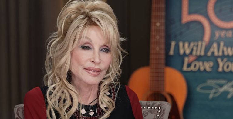 An older woman with blonde hair.