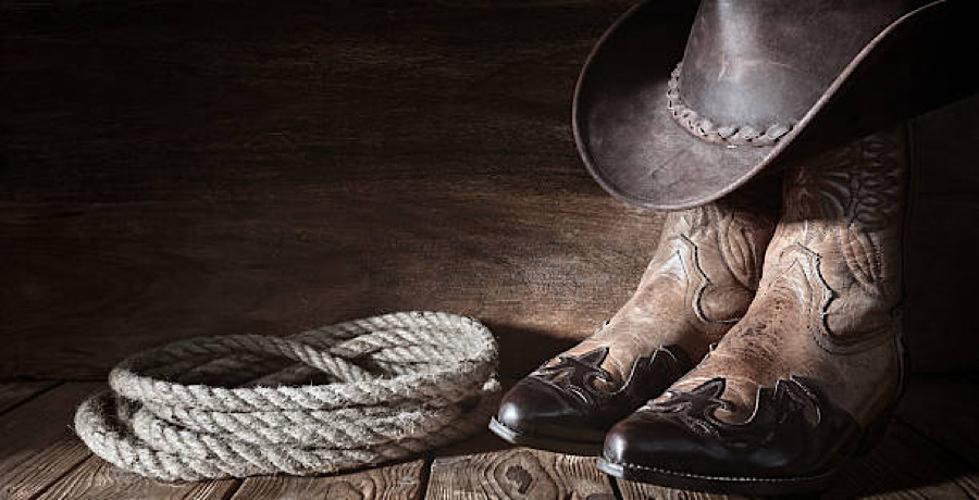 Cowboy boots, lasso, hat- iStock