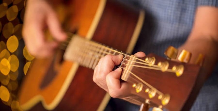 Guitar Playing- iStock
