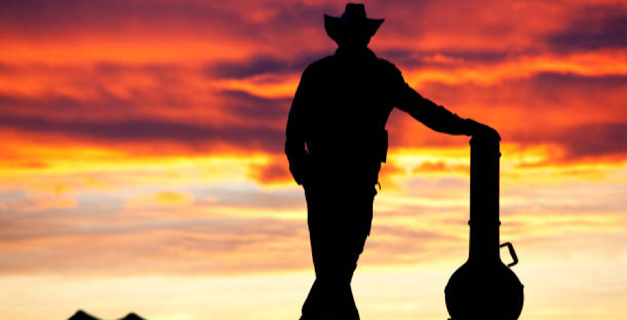 Cowboy with Guitar- iStock